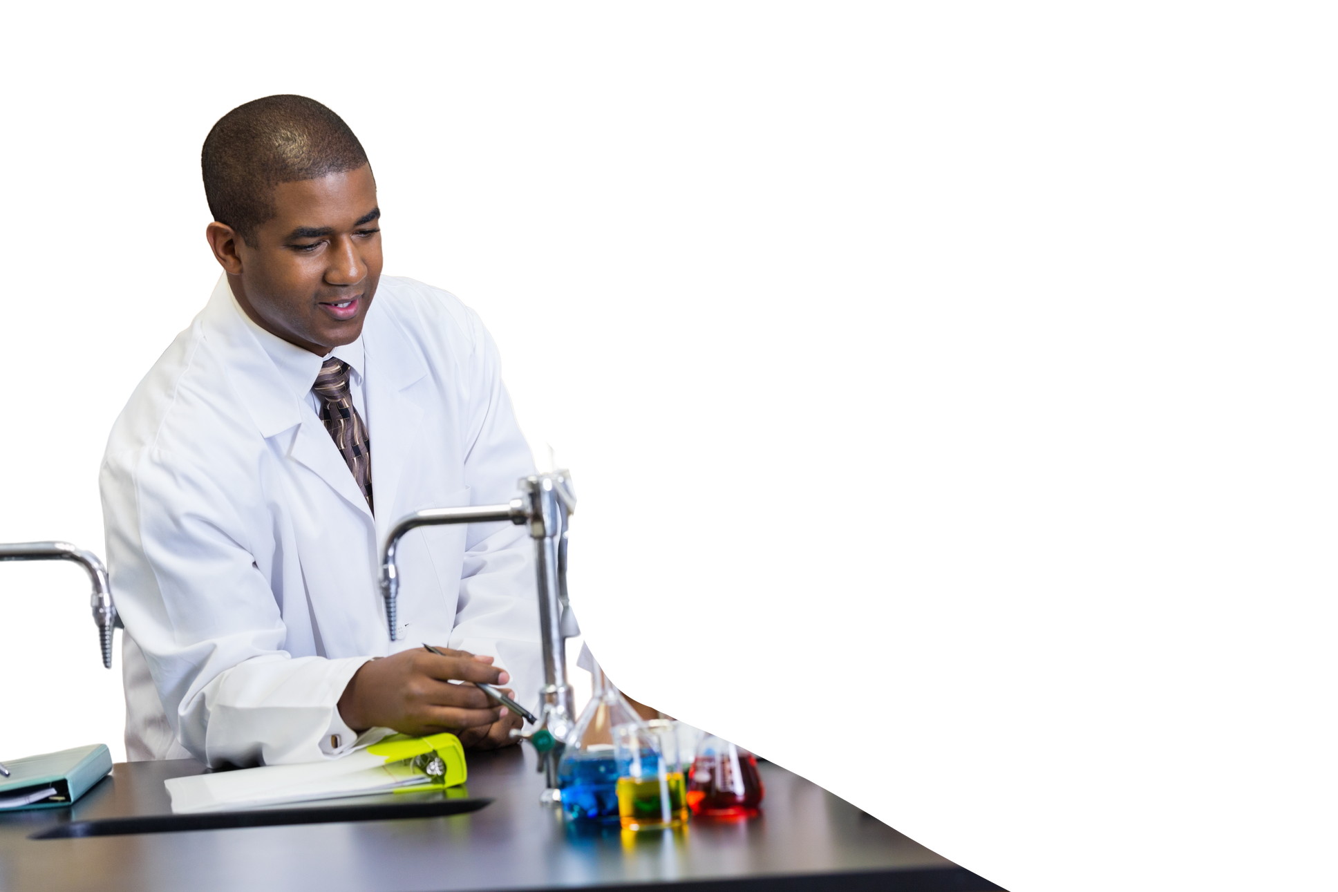 African American teacher teaching students in high school science classroom